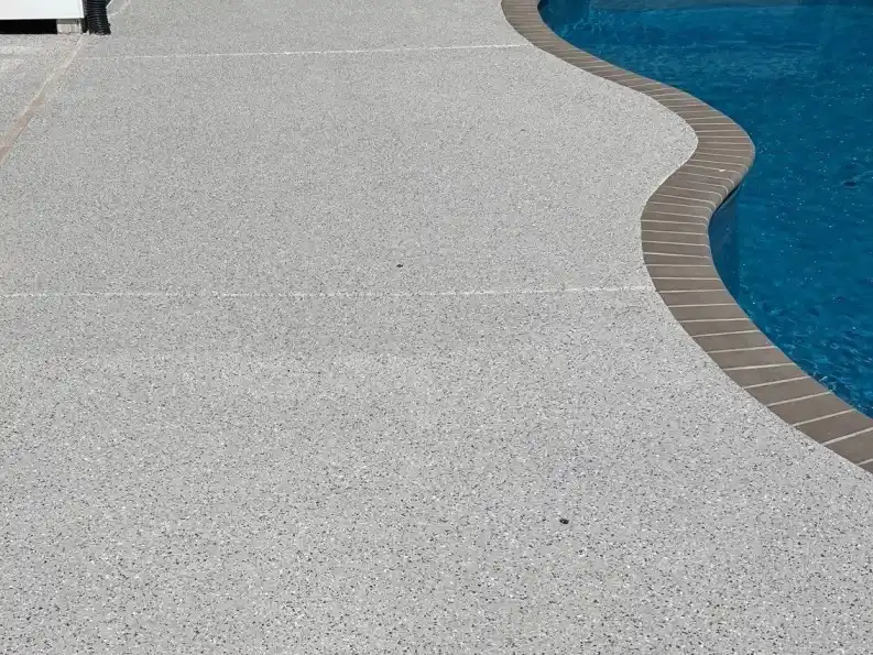 Chemical-resistant pool deck coating