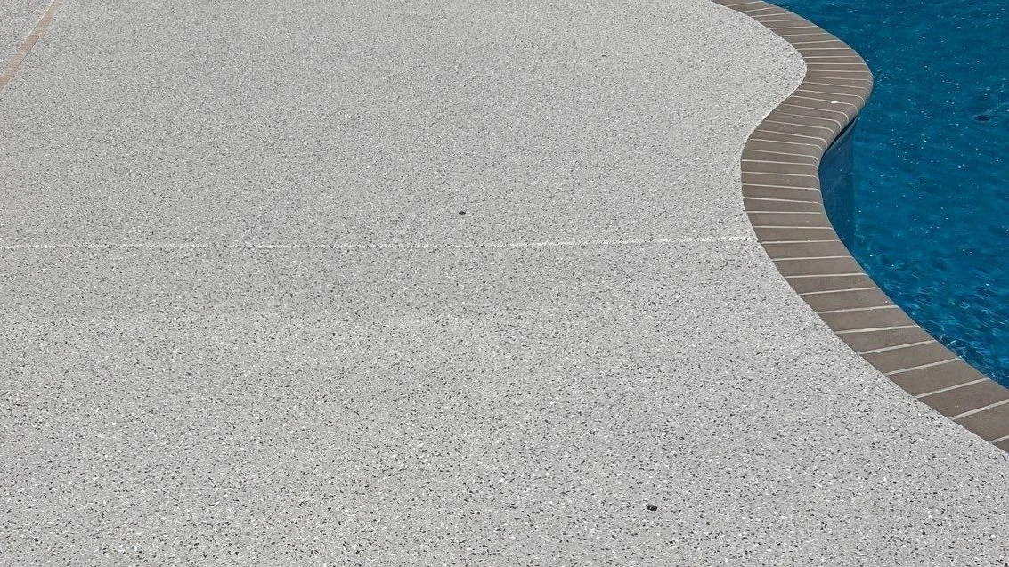 Slip-resistant pool deck coating